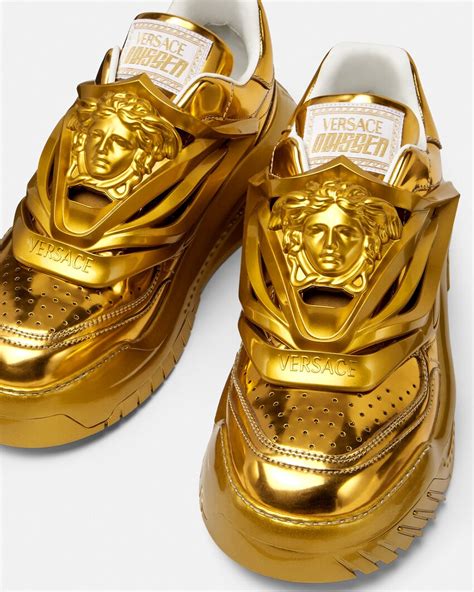 versace shoes with gold in front|Gold Versace sneakers.